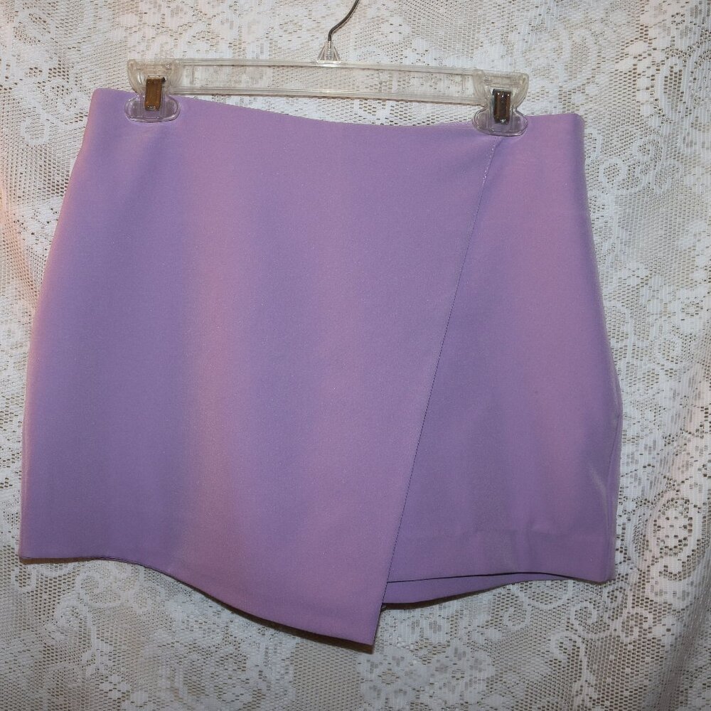 Intempo skort size 2 new with tags length is 14 inches waist is 30 inches rise i